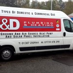 A business card on wheels with Car graphics by Border Signs & Graphics