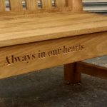 Engraving in oak memorial bench